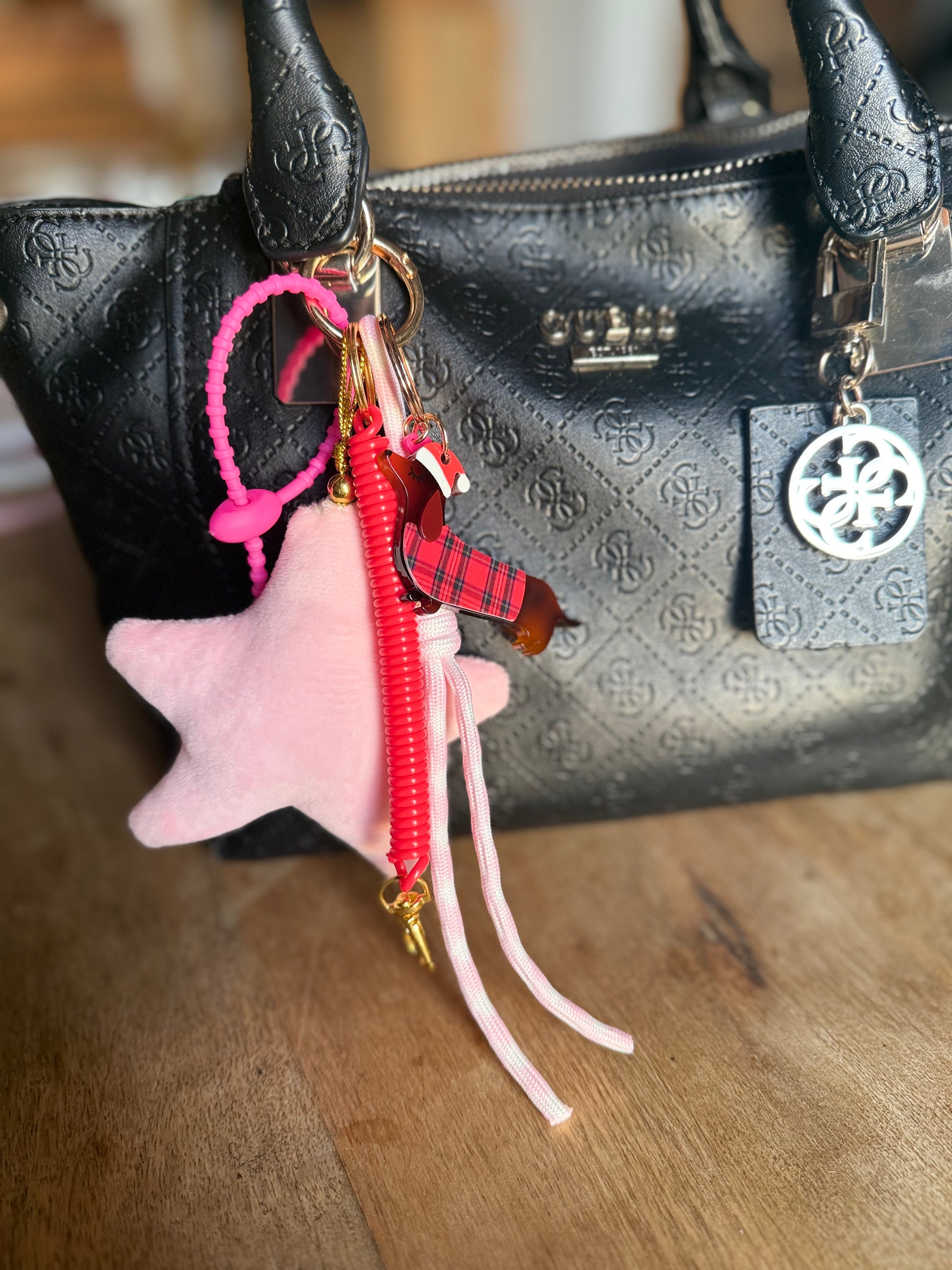 Grigri étoile de velours rose