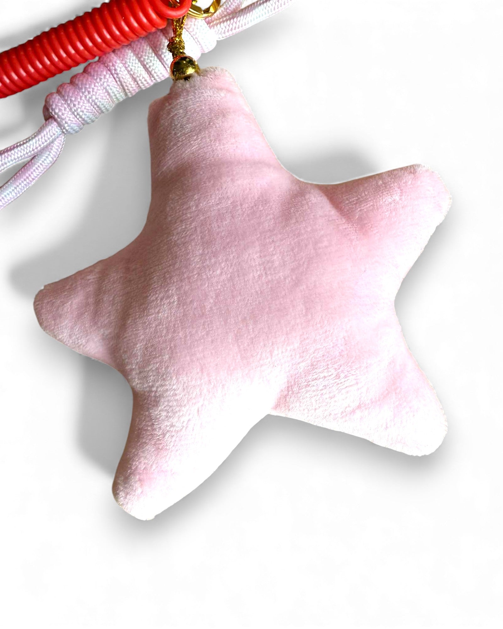 Grigri étoile de velours rose